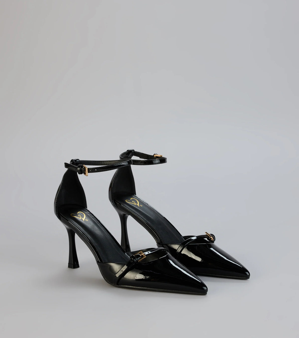 Point Taken Closed Toe Buckle Pumps